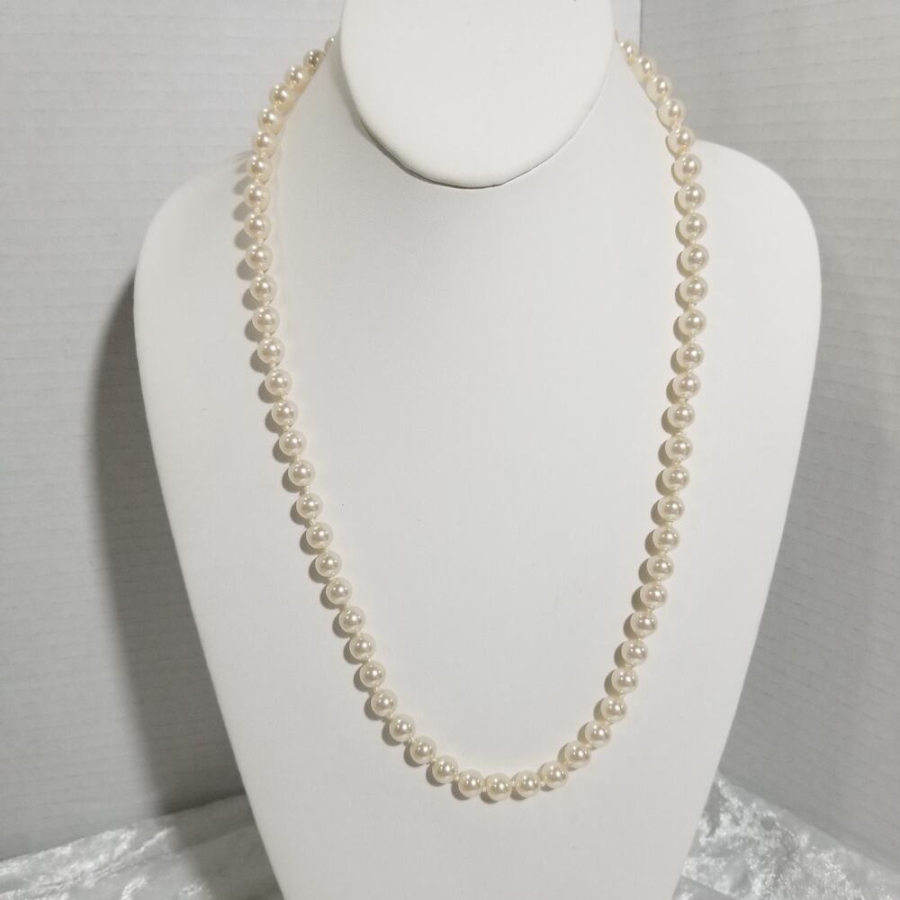 Faux pearls cream 22" tied  beads are heavy 1.1636